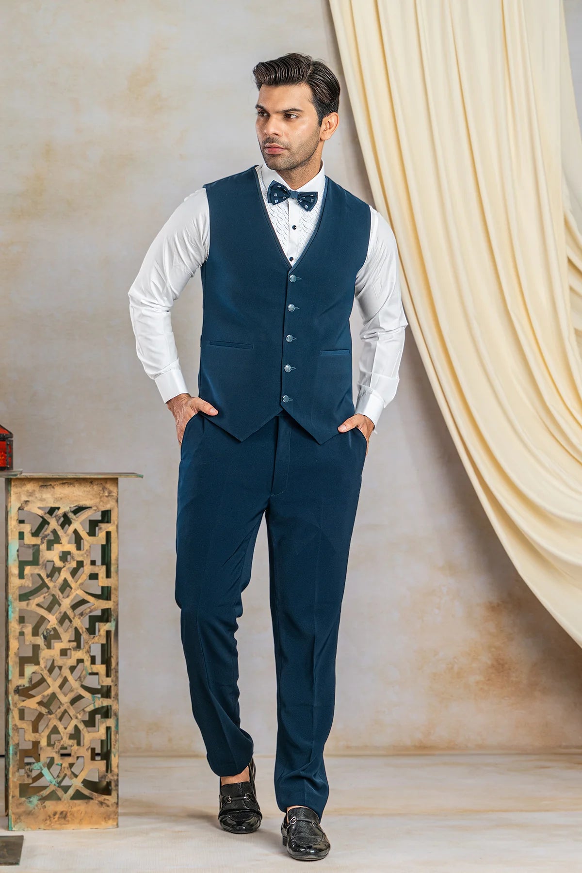 Peacock blue suit with hand work on satin lapel