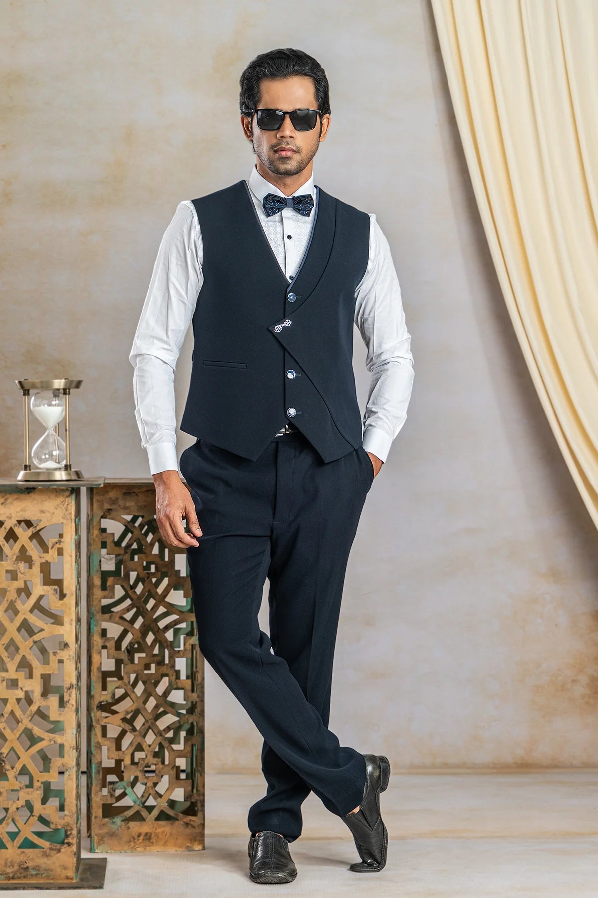 Navy blue suit with hand work on satin lapel