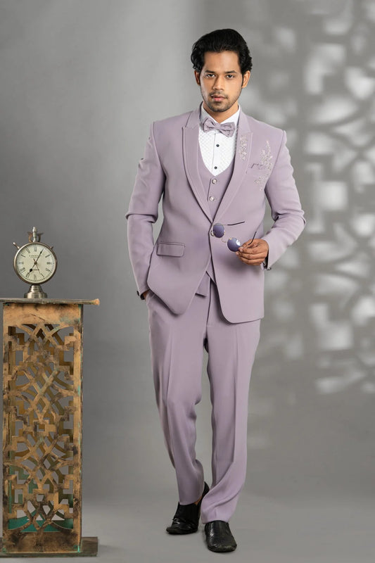 Lilac suit with hand work on chest