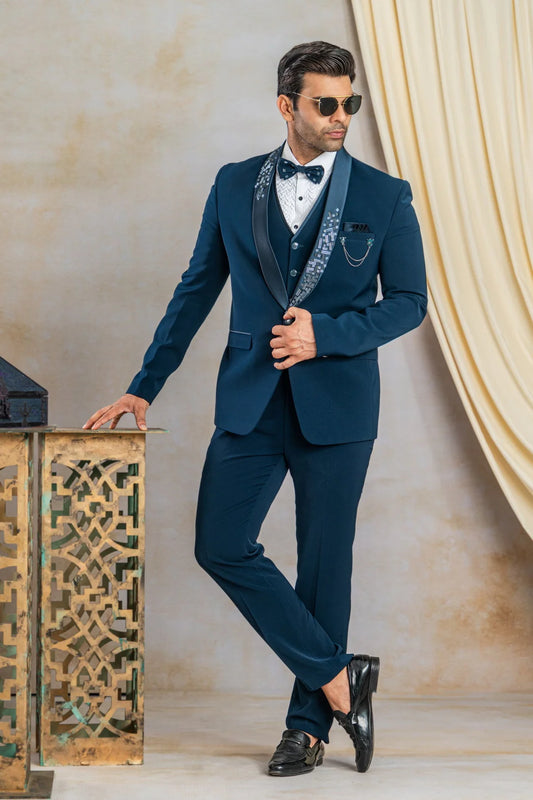 Peacock blue suit with hand work on satin lapel