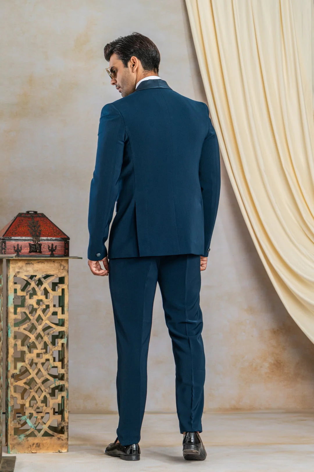 Peacock blue suit with hand work on satin lapel