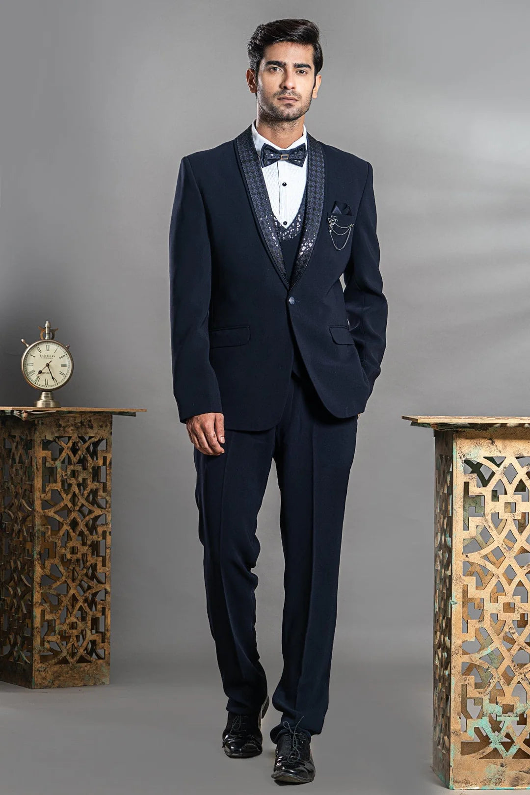 Navy blue suit with stylish sequence lapel and bow